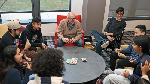 J.D. Bowers (center), dean of the Honors College at Rutgers–New Brunswick, plays Uno with a group of students, including (visible faces from left to right) Samantha Torres, Luis Sanchez-Gonzalez, Alex Liu, Ali Khan, Josh Ding and Ankita Akanksha.