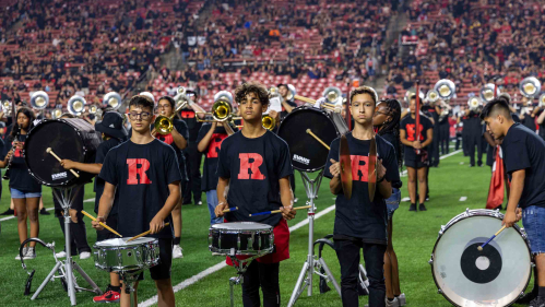 Student musicians from Carteret Junior High School, winners of 2023's "Battle of the Bands," joined the Rutgers marching band to perform the university's fight song during the Rutgers-Temple University football game Sept. 9 at SHI Stadium in Piscataway, N.J.