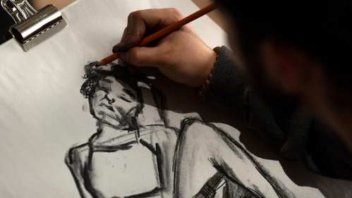 A student works on a sketch during the "Drawing Circle" at Express Newark on Jan. 29, 2026.