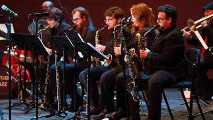 Mason Gross jazz ensemble performing on stage