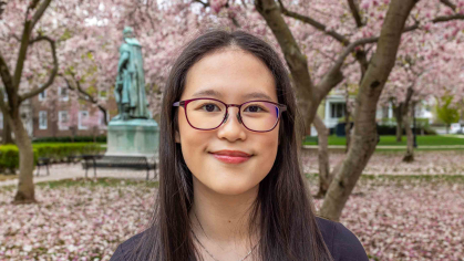 Rutgers-New Brunswick senior Amelia Khoo smiles for the camera at Voorhees Mall on the College Avenue campus.