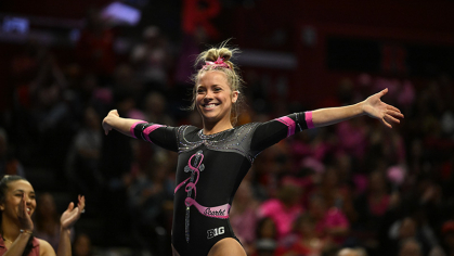 Gymnast Emily Leese celebrates her return to the beam after an injury.