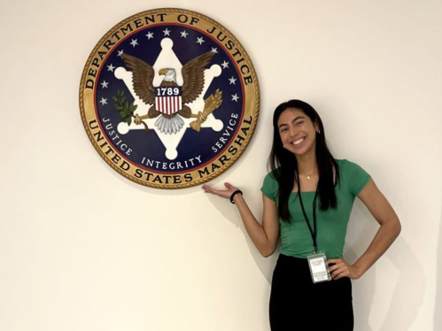Daniela Ovelar posing at the United States Department of Justice