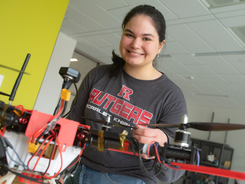 Rutgers aerospace engineering student working on a drone