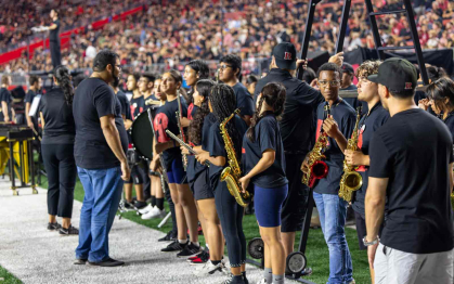 Student musicians from Carteret Junior High School prepare to perform during the Rutgers-Temple University football game Sept. 9 at SHI Stadium in Piscataway, N.J.