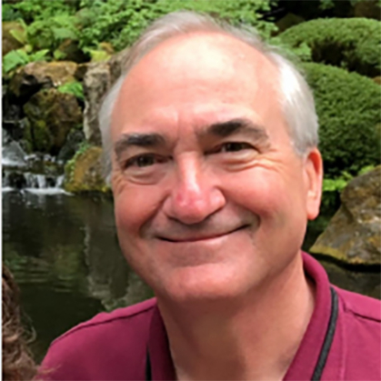 Smiling man in a red shirt