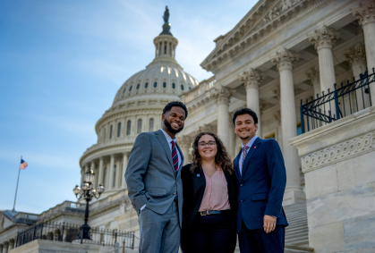Chris Godoy (right) standing with Newark and Camden RUSA Presidents on the steps of Capitol Hill in Washington, D.C. 