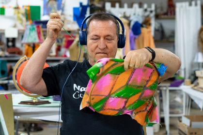 Participant sewing at Studio Route 29