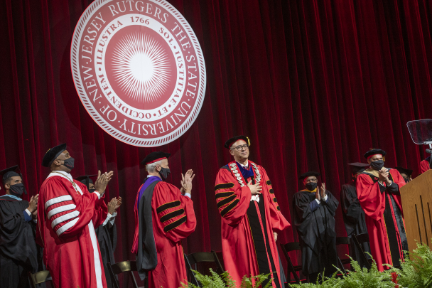 President Jonathan Scott Holloway receives a standing ovation at the conclusion of his inaugural address