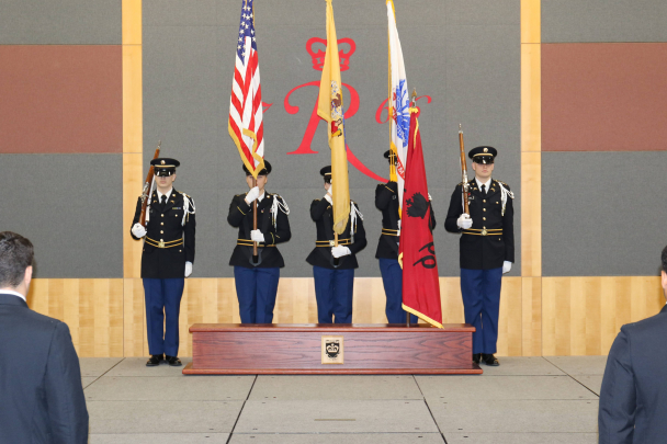 Rutgers Army ROTC students placing flags on stage