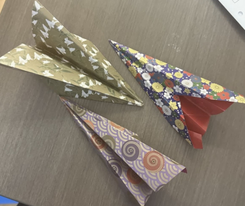 Healing Hues & Harmony paper airplanes