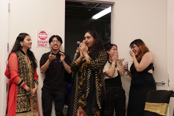 students cheering on the winning organization for the best academic/educational program award